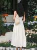 2026 summer new French V-neck white suspender dress women's waist design sense niche temperament small skirt