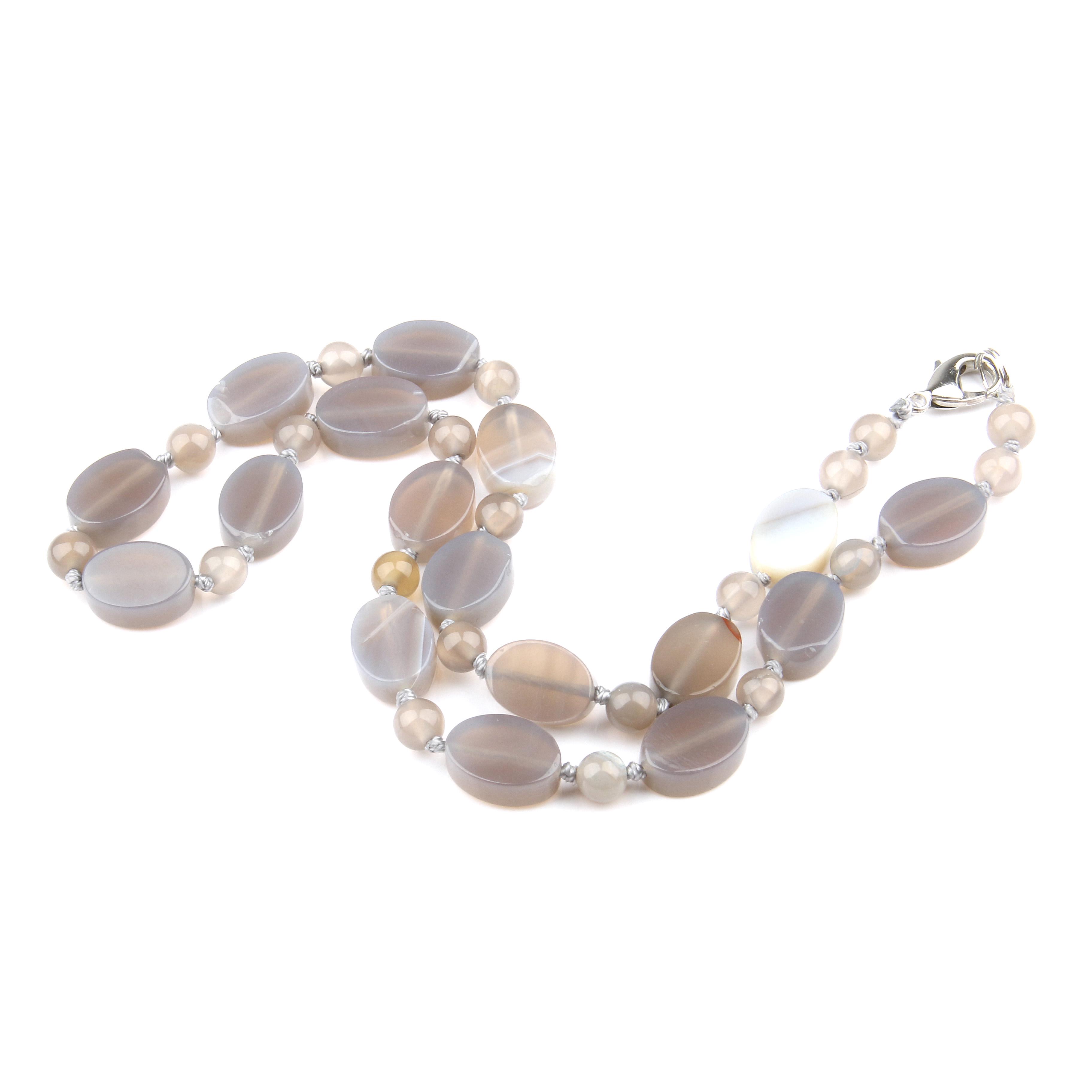 

Женские ожерелья из полудрагоценных камней