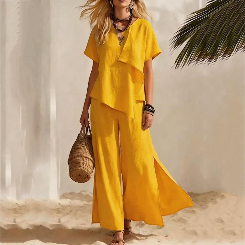 Completo estivo casual da donna in due pezzi, top ampio a maniche corte con pantaloni a gamba larga, outfit leggero e comodo per l'uso quotidiano