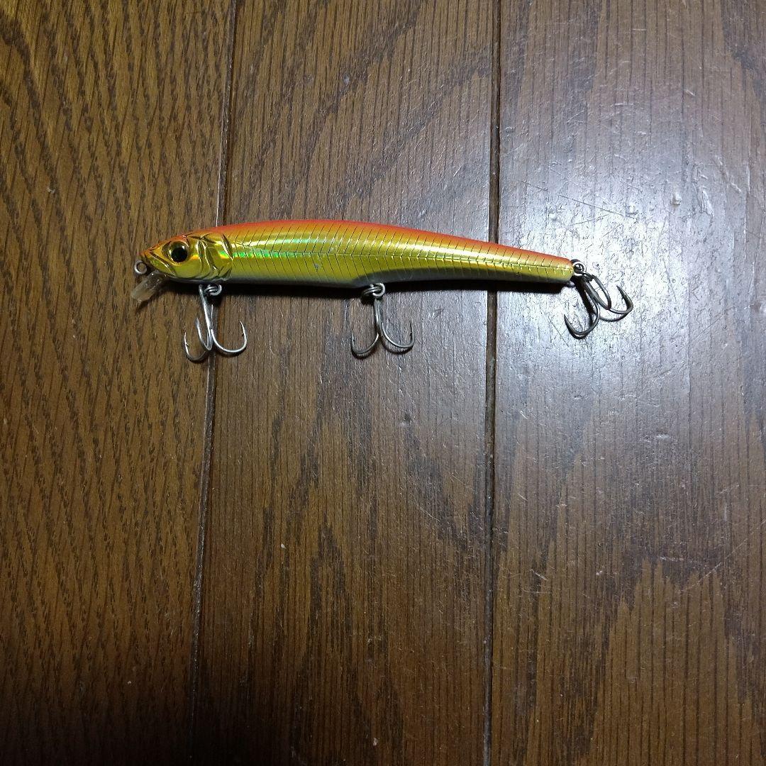 Used Minnow type lure orange/gold