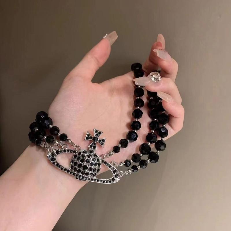 Elegante mehrschichtige schwarze Kristall-Planeten-Anhänger-Halskette Perlenhalskette für modebewusste Frauen, die einzigartige Stile suchen