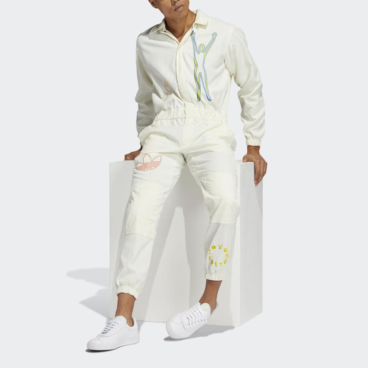 Adidas Originální volná kombinéza s potiskem trojlístku Unisex kombinéza Béžová H43972