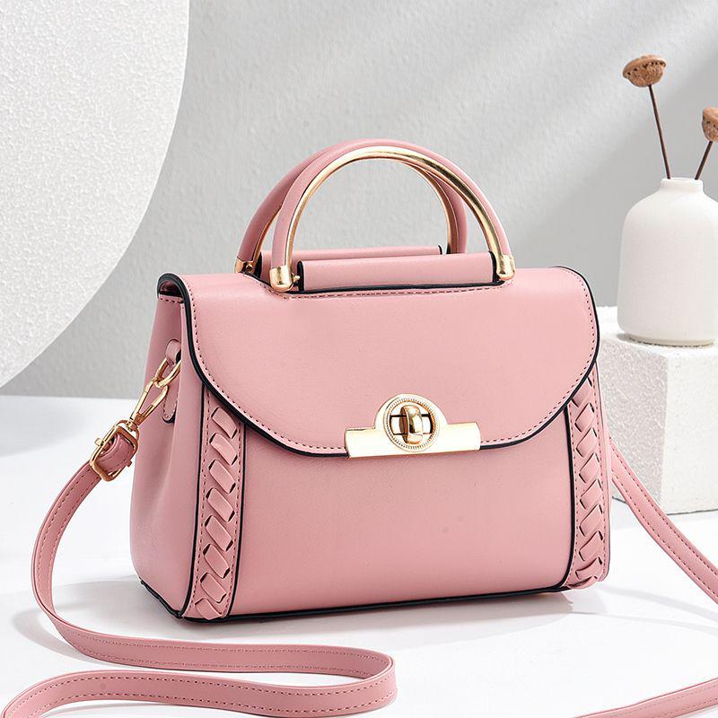

2025 Spring/Summer Fashionable Korean Style Twist Lock Crossbody & Shoulder Bag розовый