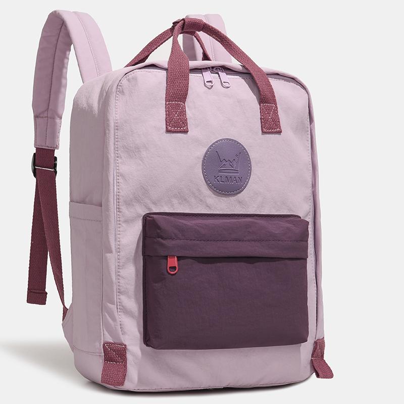 Farbblock-Rucksack mit Fronttasche und gepolsterten Schultergurten
