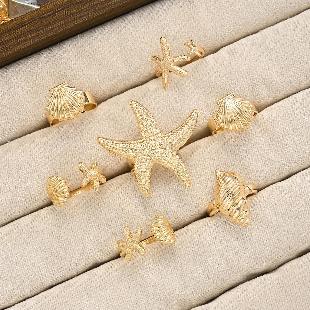 7 Pcs Gold Metal Ring Set for Women Starfish Shell Geometric Flower Knuckle Rings Vintage Daily Stackable Fashion Jewelry Gifts