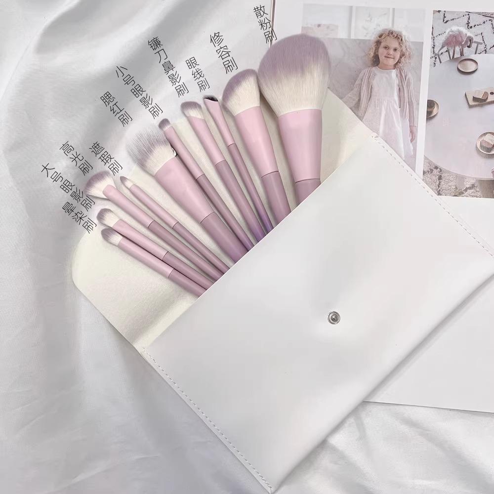 Xing Dai Zi 10-Piece Makeup Brush Set: Powder, Blush, Eyeshadow Brushes - Essential Beauty Tools.