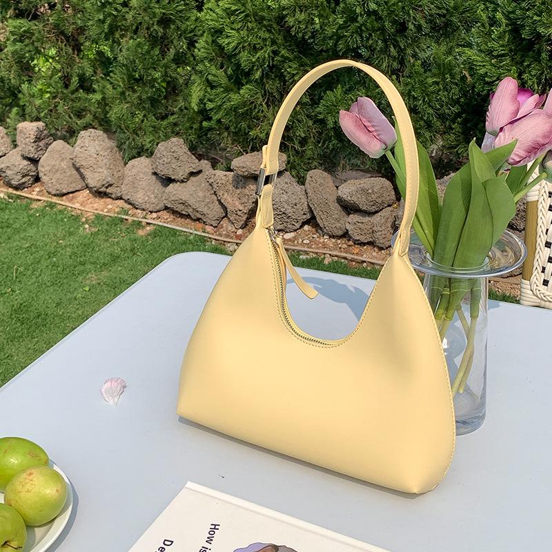 

Single Shoulder Women s Bag, Niche Design, High-end Sense, Shaped PU Dumpling Bag, Large Capacity, Fashionable and Versatile Armpit Bag жовтий