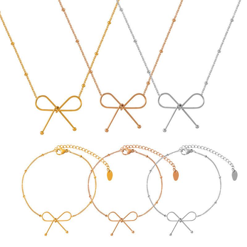 Magazine Italien Style Simple Chaîne Clavicule Acier Titane Plaqué Or Réel 18K Ensemble de Bijoux Bracelet Collier Nœud