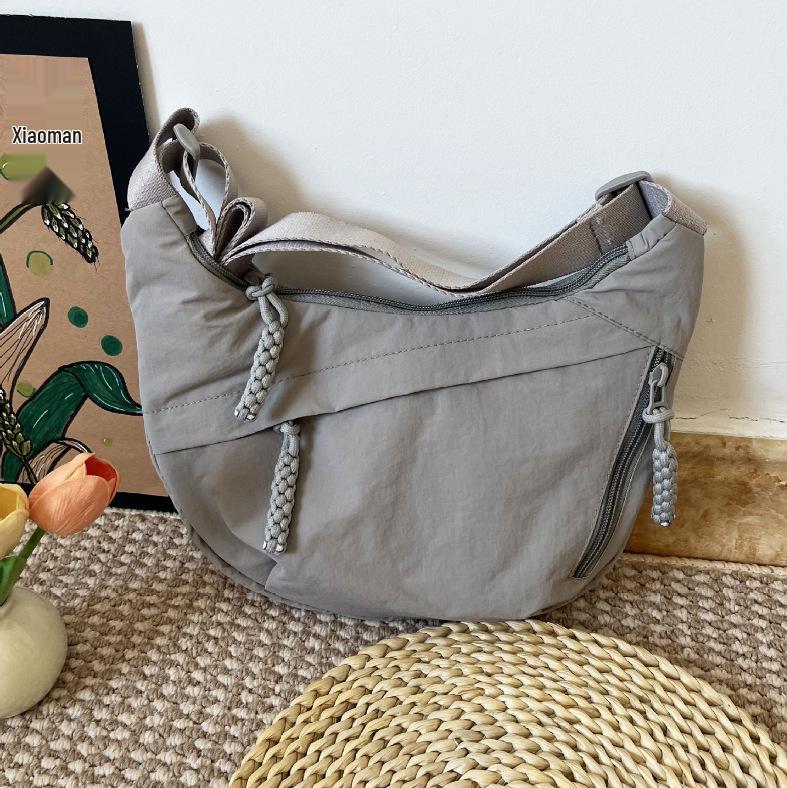 Универсальная легкая женская сумка-кроссбоди пельмень - Вместительная повседневная сумка на плечо 34x9x22 990₽