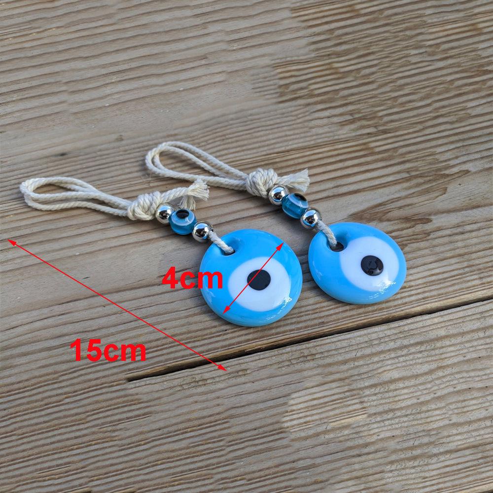 

Брелок-подвеска «Рука Фатимы» из плетеного вручную синего стекла