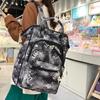 Harajuku printed portable clip student schoolbag Korean version large-capacity backpack