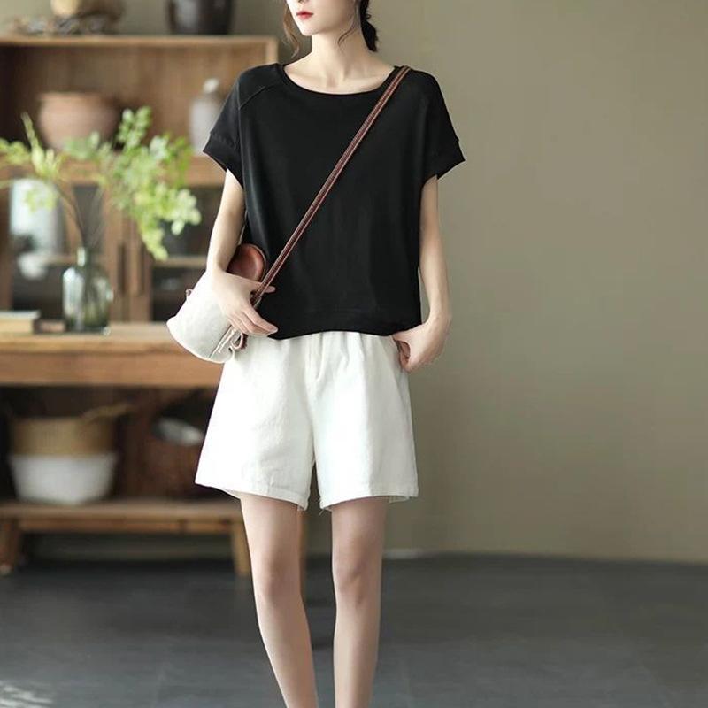 

Летние новые универсальные зарубежные корейские версии топов с короткими рукавами популярны в этом году, свободные с круглым вырезом, скрывающие недостатки фигуры и стройнящие женские вещи 3XL чёрный