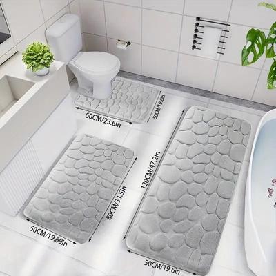 Tappetino da bagno antiscivolo con motivo pietra in rilievo