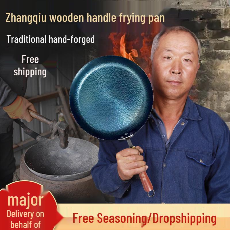 Ručně kovaný litinový nepřilnavý wok s plochým dnem a dřevěnou rukojetí