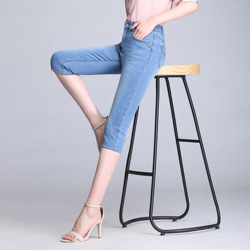 Sommar Stretch sju-minuters jeans med hög midja för kvinnor Ljus färg Elastiska Casual ridbyxor