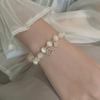 New Bracelet Women's Lucky Four-Leaf Flower Crystal Bracelet Elastic Rope Pearl Transfer Bead Hand Chain Jewelry Bangles Gift