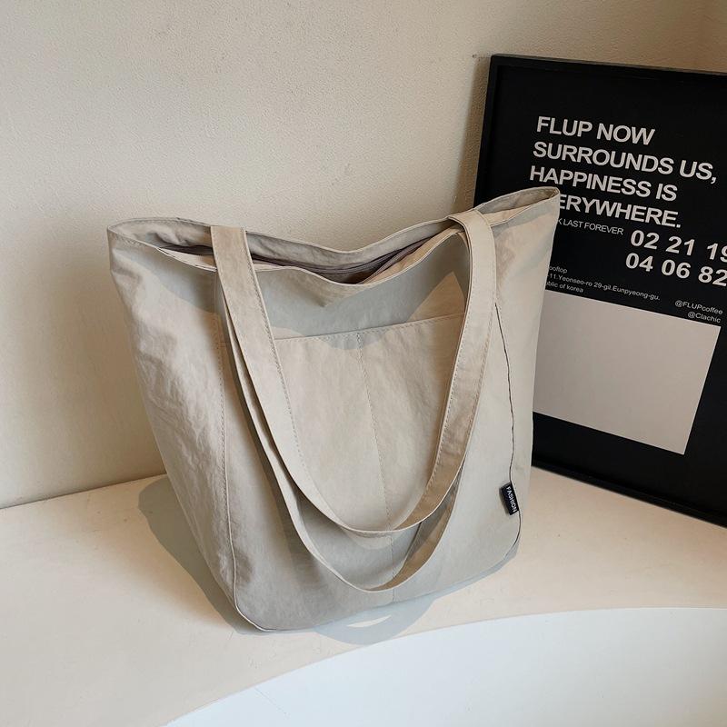 

Японская эстетика зарубежный стиль индивидуальность повседневная наплечная сумка женская студенческая классная сумочка нишевая сумка-тоут для поездок на работу