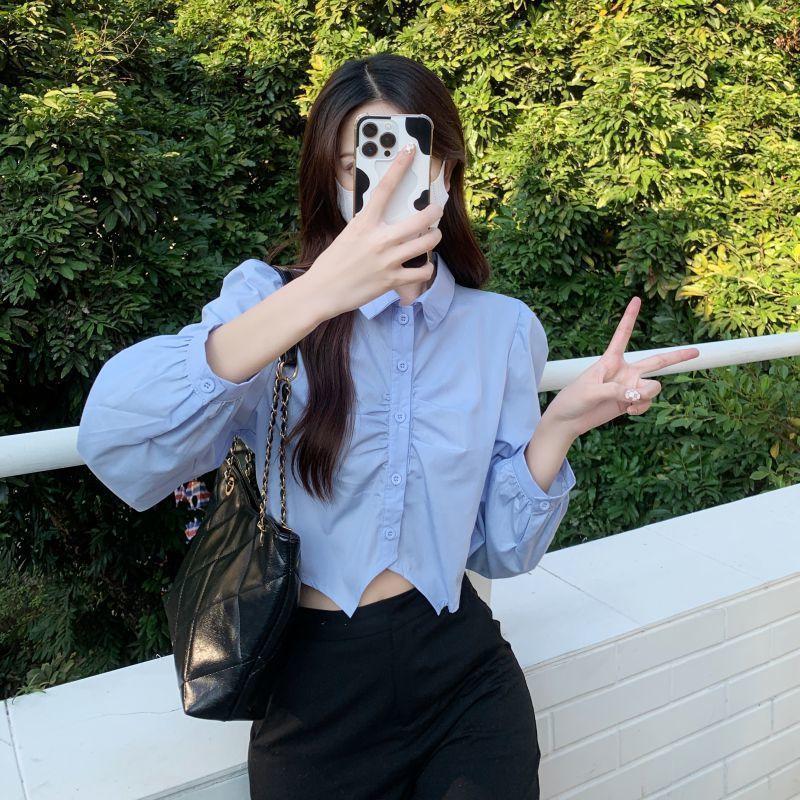 Short shirt women's white shirt women's spring and autumn new Korean version design pleated college style age-reducing pure desire top