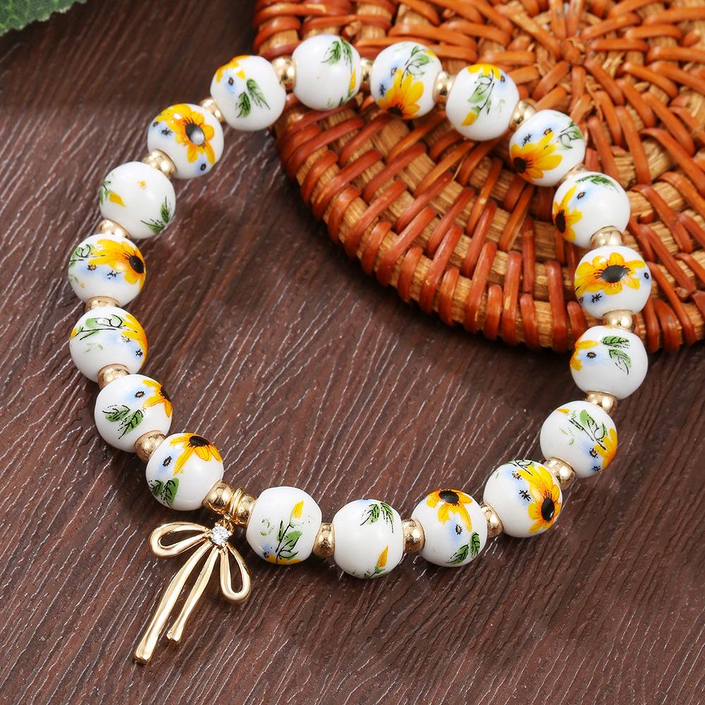 

Браслет JYL TS Женский Бохо Дизайн с Бусинами Океан Повышает Радость ZJ14709 мягкий желтый