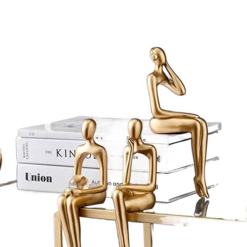 Luxuriöses abstraktes kreatives sitzendes Figurenornament für TV-Schrank oder Bücherregal