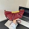 Holding An Underarm Bag with A Unique Design, A Single-shoulder Crossbody Bag for Formal Events