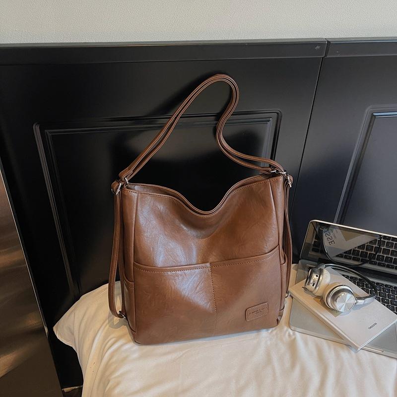 

Женский рюкзак для поездок на работу 2025 осень новый высококачественный вместительный наплечный рюкзак популярная ретро зарубежная сумка-тоут