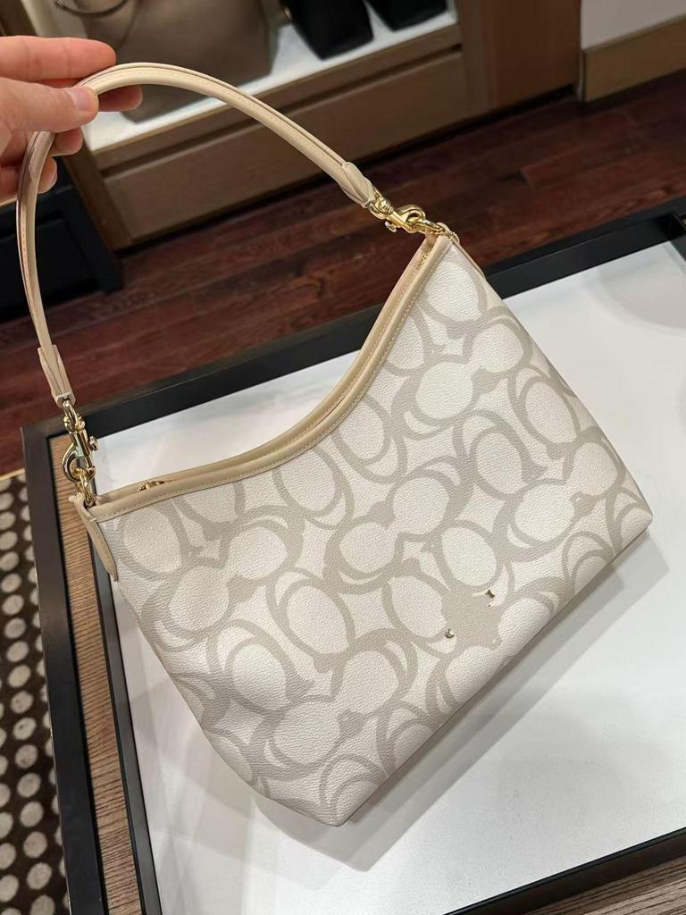 Coach Laurel Hobo Bag: Versatile, Large-Capacity Shoulder, Crossbody, and Handbag for Women.