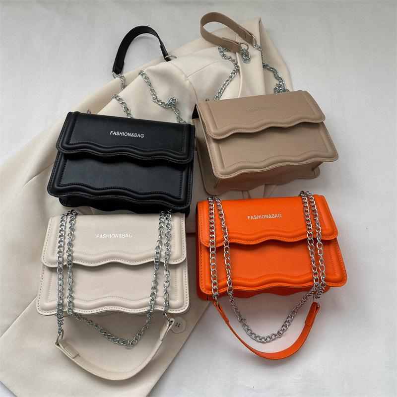 Korean Style Small Square Women's Crossbody Bag - 2025 Solid Color, Wave Pattern, Chain Shoulder, Simple Fashion.