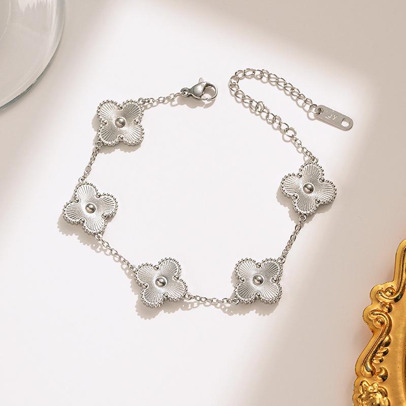 Elegant Four-Leaf Clover Necklace & Bracelet Set - Titanium Steel, Laser-Cut Design, Stylish for European & American Fashion.