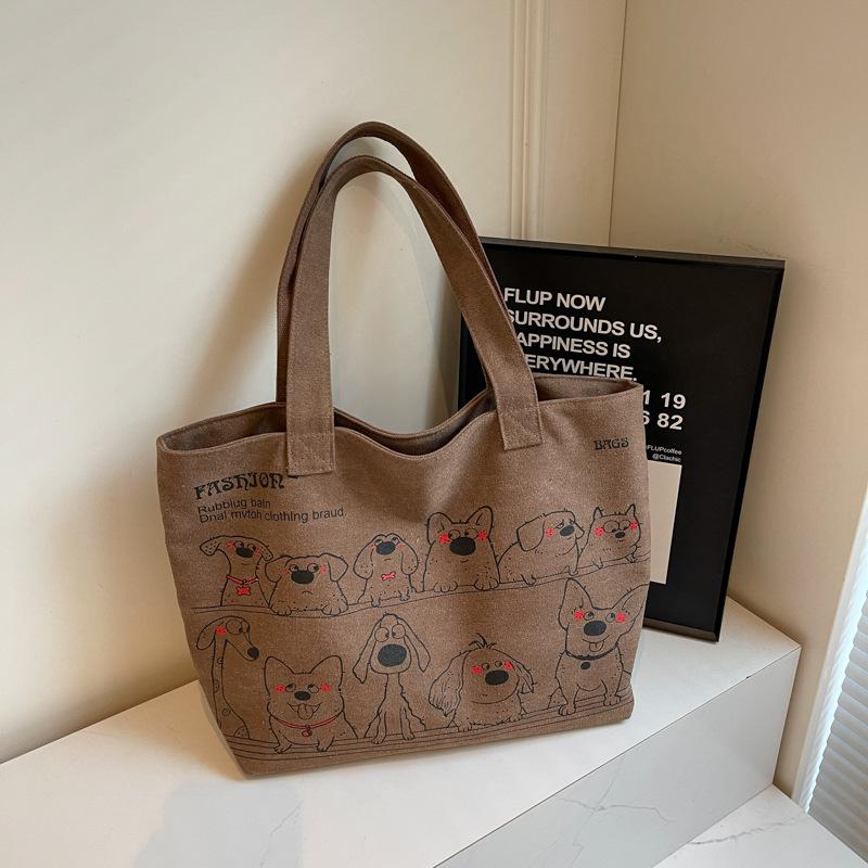 

Big bag women s new casual versatile tote canvas bag large capacity commuter shoulder bag темно-коричневого кольору