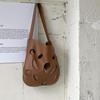 Irregular hollow shoulder bag women's niche design commuter bag large capacity new retro wind tote bag women