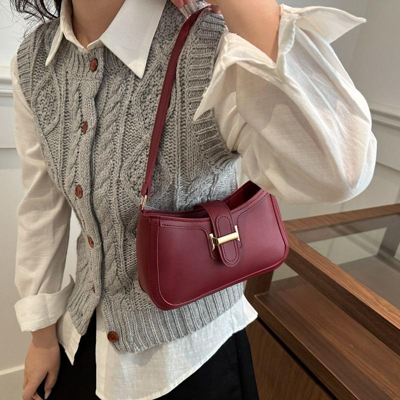 Frühling und Sommer neue vielseitige Temperament Damen einfarbig hochwertige Textur Pendeln Achseltasche Damen Handtrage tragbare Schultertasche