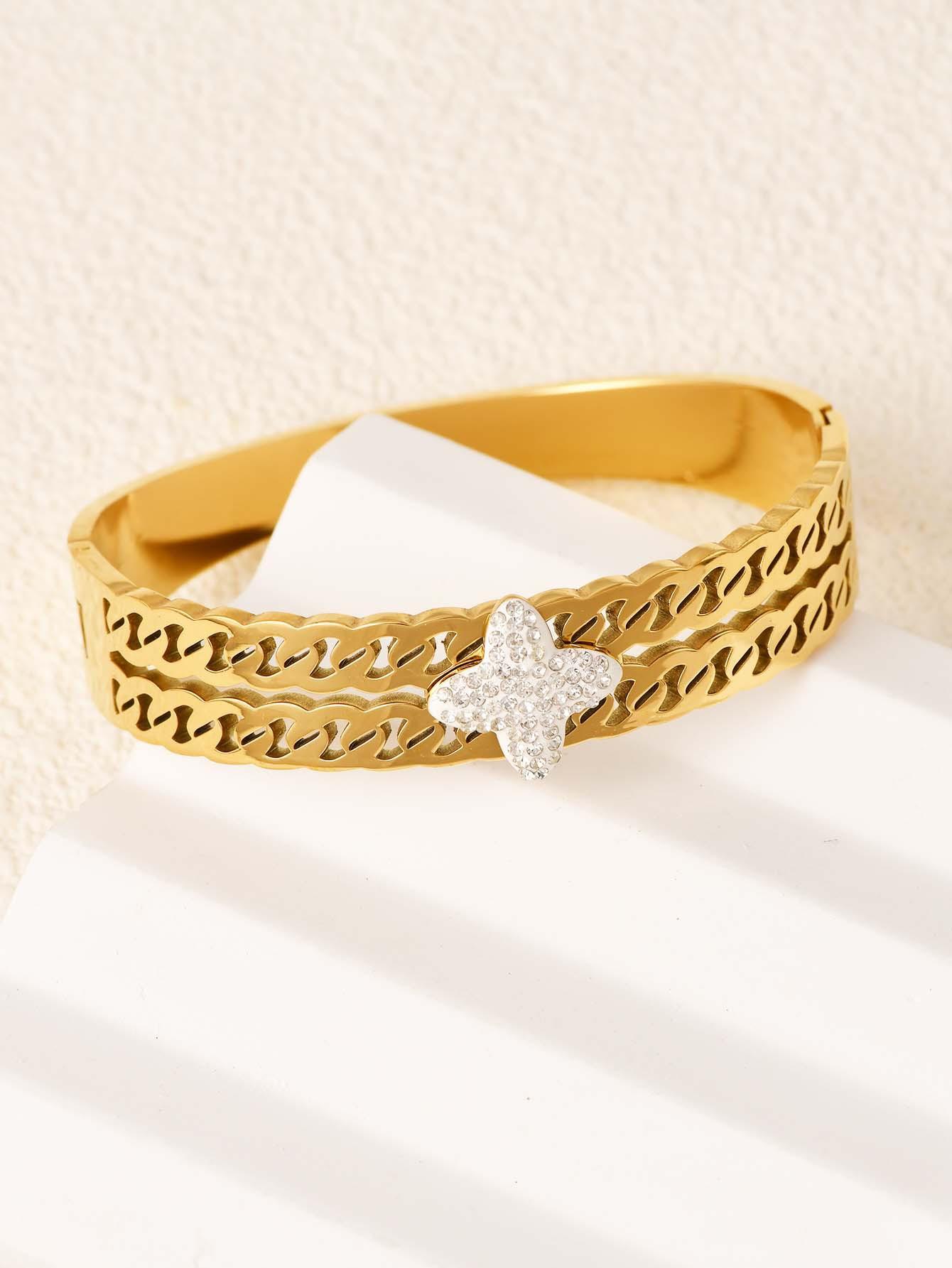 

European and American new hollow titanium steel gold jewelry full of diamonds four-leaf clover non-fading gold bracelet золотий