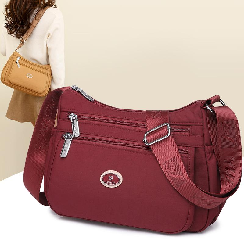 Bag 2025 new shoulder messenger bag nylon bag casual dumpling bag women's bag trend light luxury