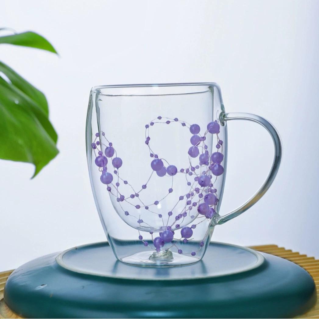 

Double-walled glass coffee/milk tea cup with embedded pearl strand decoration 1pc