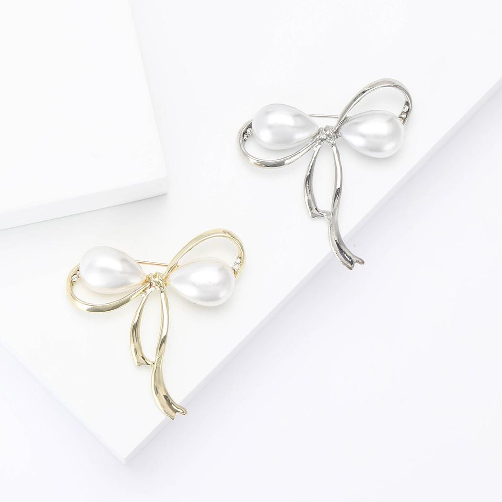 High-End-Mode Legierung Perle Schleife Form Brosche Temperament Einfache Damen Kleidung Corsage Schmuck Pin