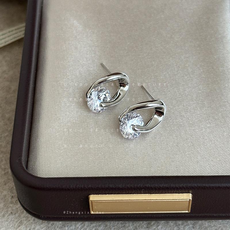 Silver Needle Cubic Zirconia Hollow Oval Stud Earrings - Stylish, Elegant, and Light Luxury Design.