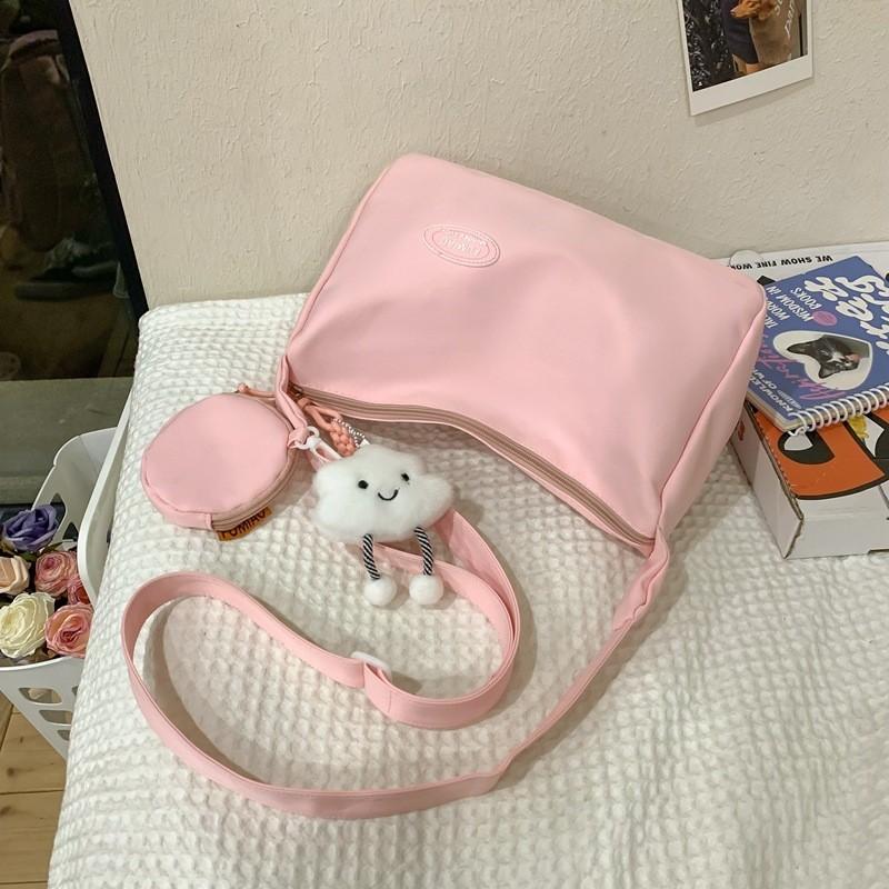 

Trendy Waterproof Canvas Shoulder Bag With Stylish Stitching Elements For School And Commute