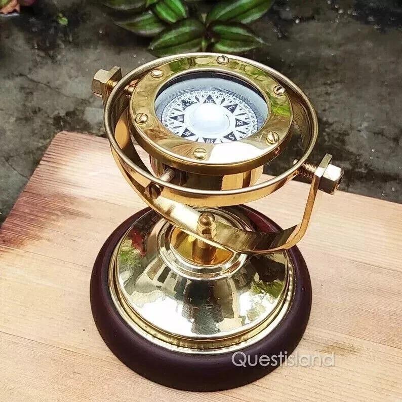 Brass Gimbal Compass with a Wooden Base Is a Wonderful Addition To Any Collecti