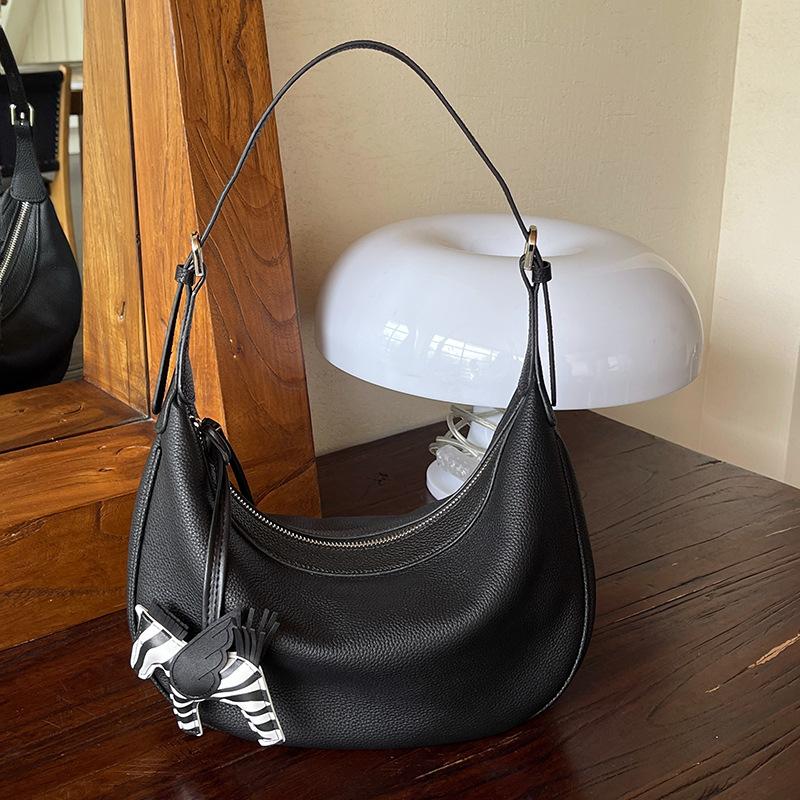 

2025 Новая женская сумка-мессенджер, высококачественная сумка под мышку, женская сумка из коровьей кожи первого слоя, нишевая сумка-полумесяц из натуральной кожи 32CM чёрный