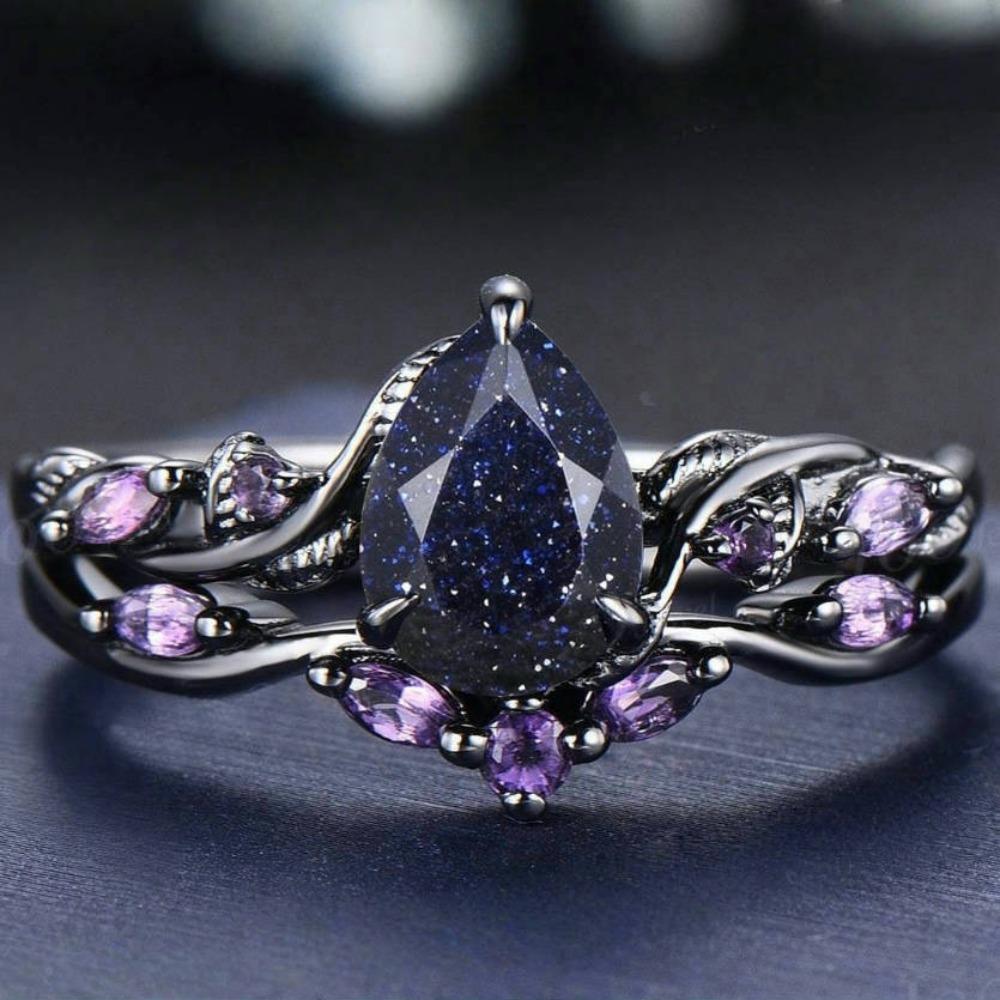 Fashionable, simple, and elegant ring with black band, water drop, and purple-toned floral leaf design 6 серебряный