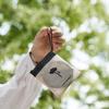 Portable handheld folding fan with storage bag, compact and portable, suitable for outdoor activities in summer
