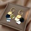 Contrasting color disc fringed earrings, new Hong Kong style temperament, long versatile stud earrings, European and American earrings.
