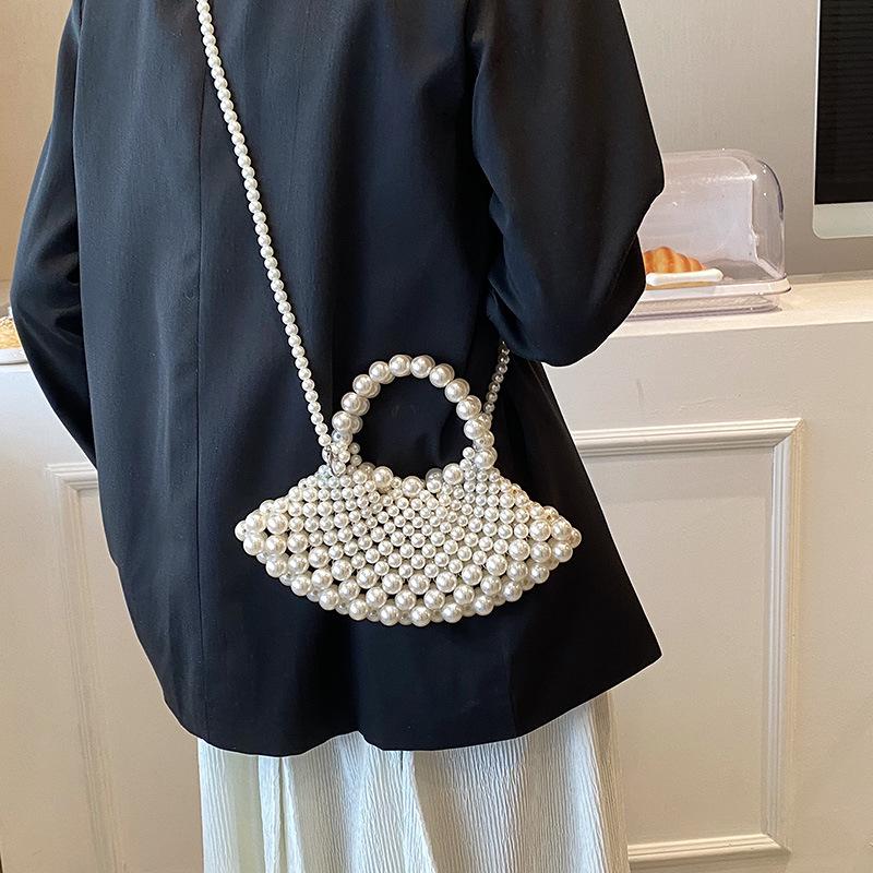 Bag summer new 2025 Mori foreign style Internet celebrity pearl woven bag ins wind one shoulder oblique fairy beach bag