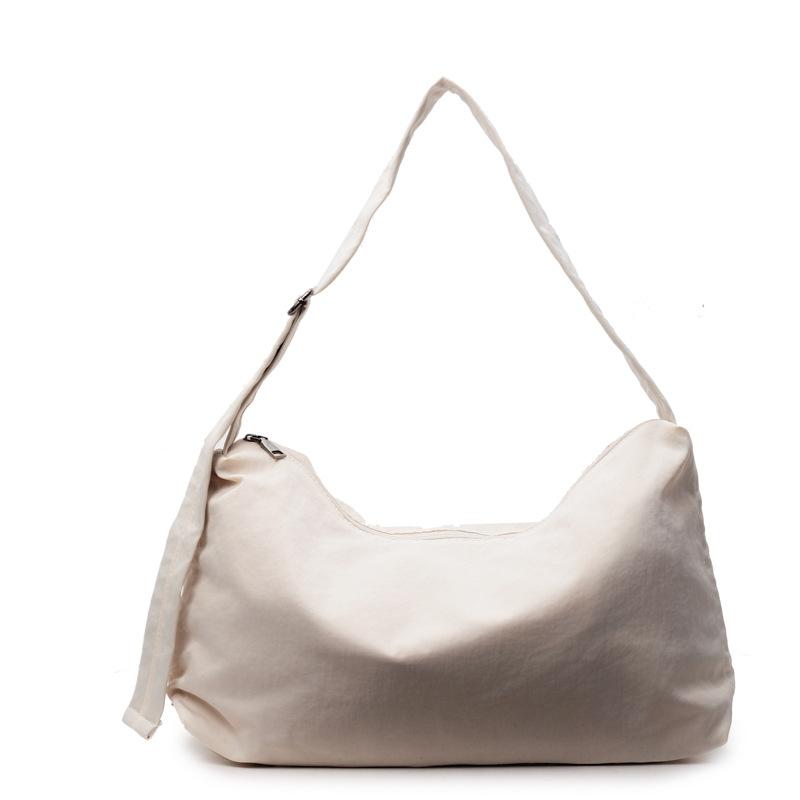 

Canvas bag women s large-capacity new spring and summer casual solid color fashion shoulder messenger bag commuter tote bag