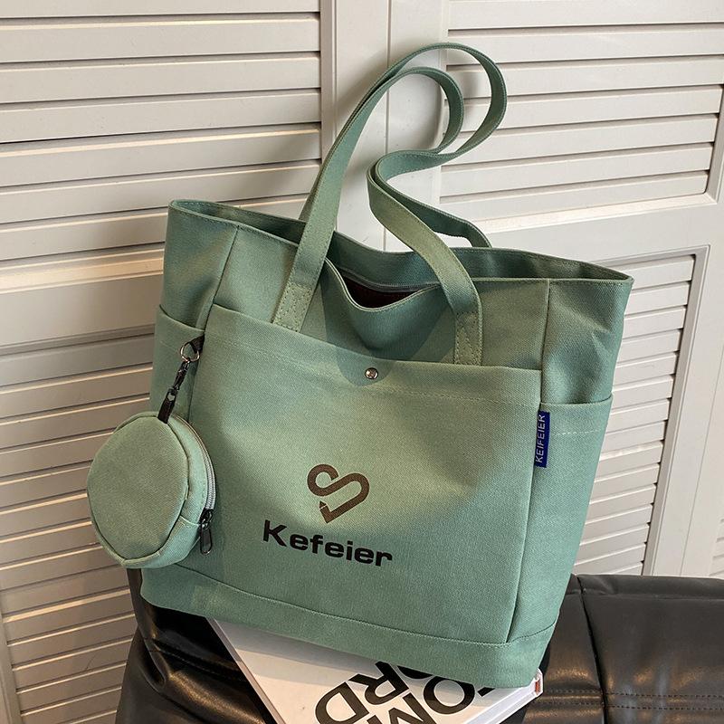 

Canvas bag, women s large-capacity 2024 new high-end shoulder bag, college student class versatile commuter tote bag зелёный