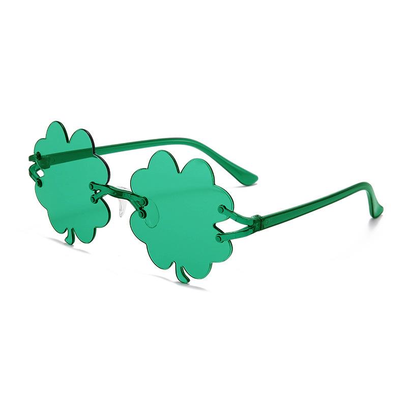 Four-leaf clover frameless candy-colored sunglasses, quirky street style fashion show decorative sunglasses