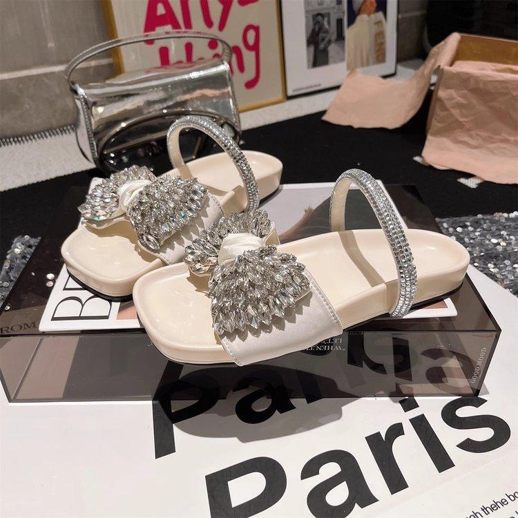 2024 new European flat-bottomed bow rhinestone slippers women's cross with satin open-toed fashion outer slippers