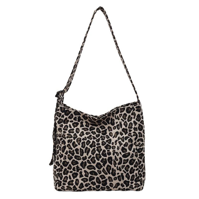 Fashion leopard print canvas bag women's 2025 new Korean version large-capacity messenger bag commuter shoulder armpit tote bag