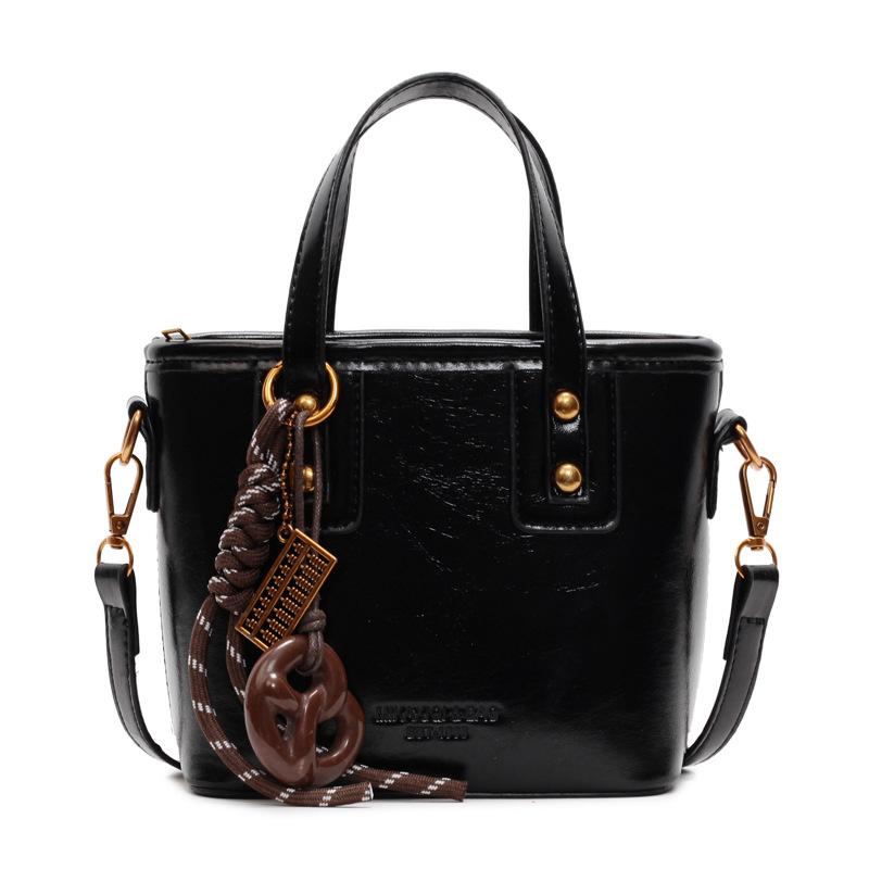 

Hand-held retro casual bucket bag women s 2025 new trendy fashion shoulder bag Korean version of high-end versatile women s bag No pendant